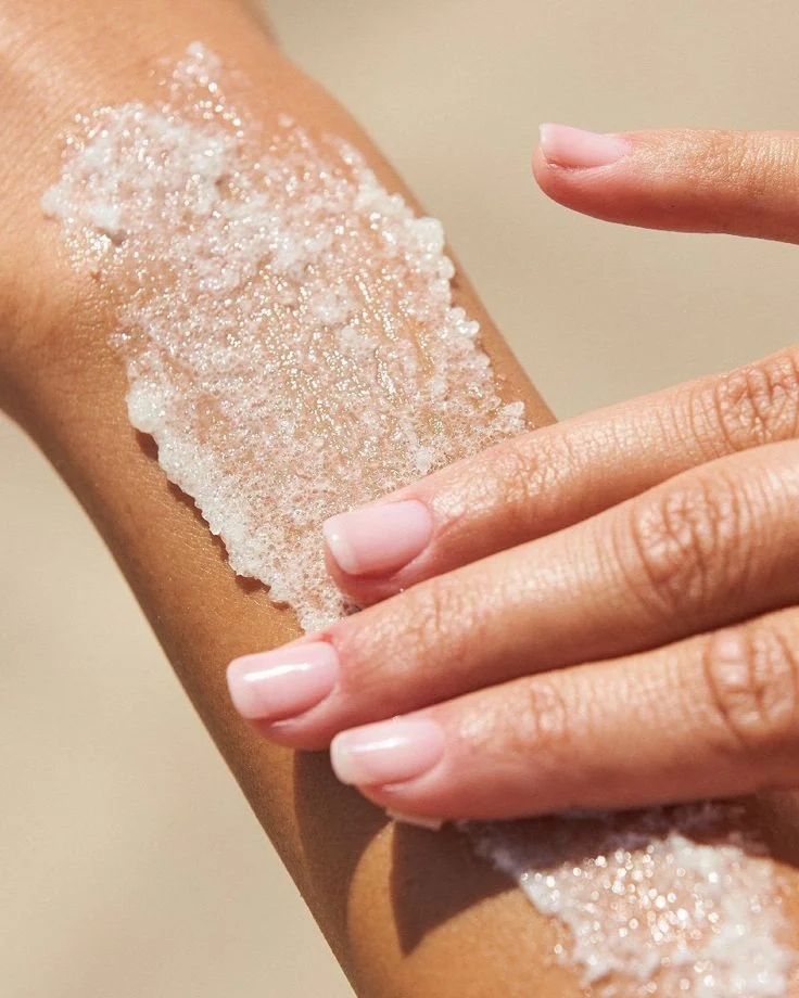 Gentle exfoliating care on a forearm